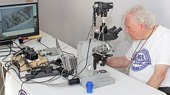 Graham Matthews photographing Spirogyra